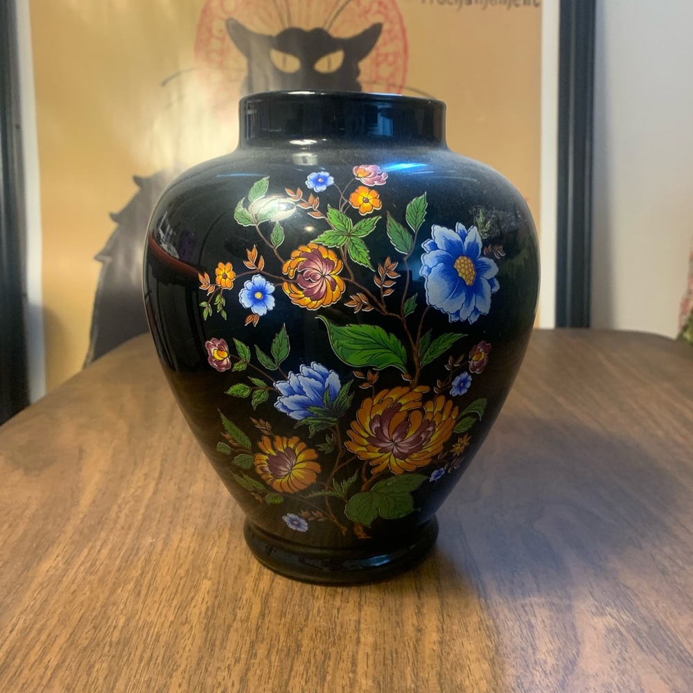 Black vase with floral design